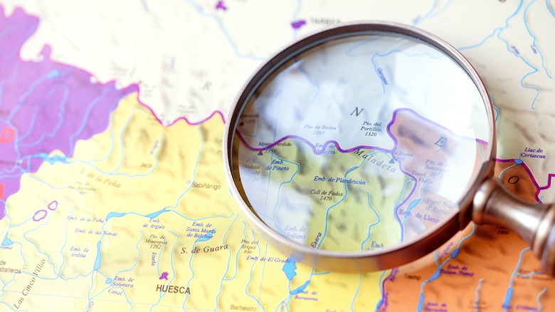 Magnifying glass over map 