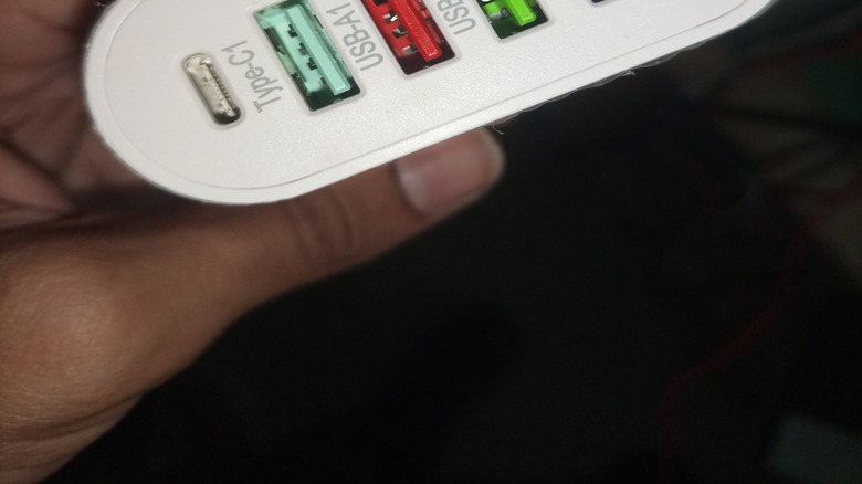 A row of colored USB ports