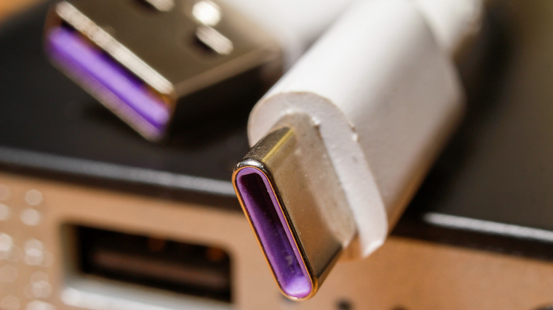 A USB type C data cable with purple color port