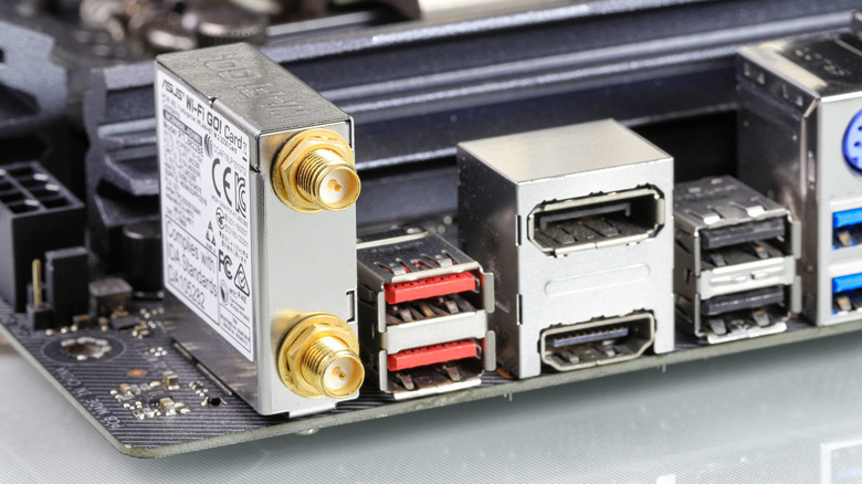 Modern computer mainboard showing multiple ports like HDMI, Display port, USB 3.2 type A, and USB 3.1