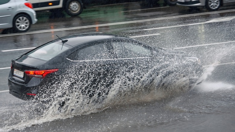 Car driving through rain