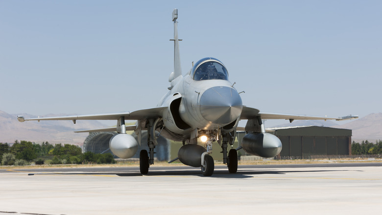 A JF-17 taxiing on a runway.