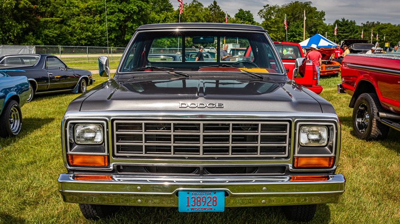 1981 Dodge Ram 1500 parked on grass at car show