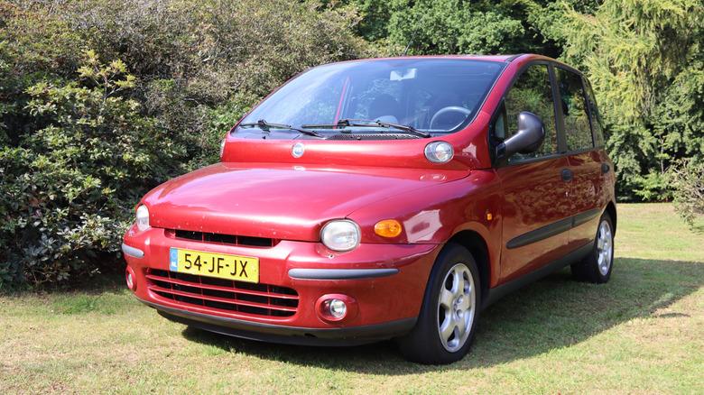 Red Fiat Multipla in woods