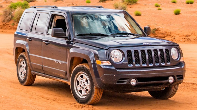 Black Jeep Patriot in desert