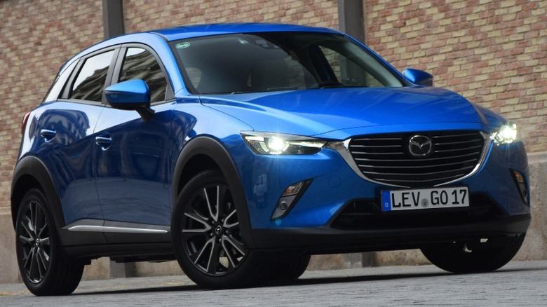 Parked blue Mazda CX-3