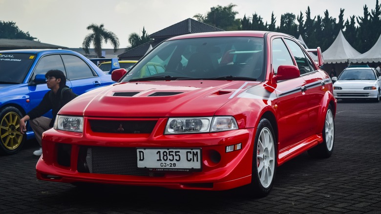 Red Mitsubishi Lancer Evolution front end