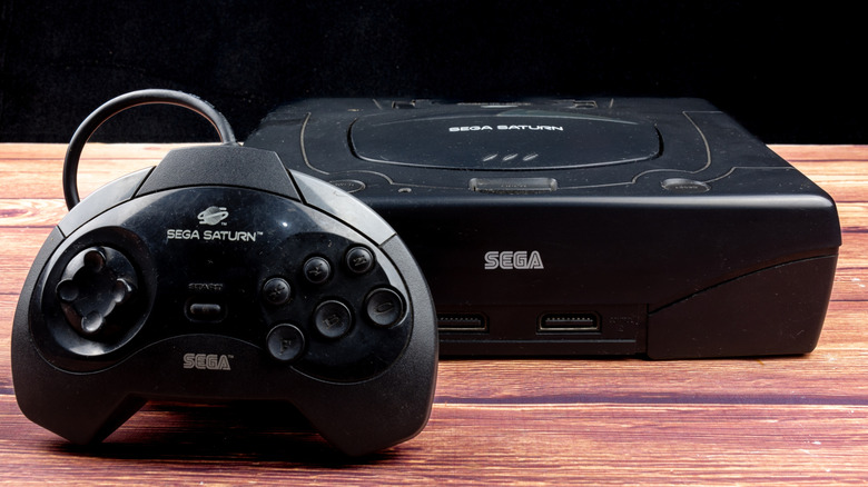 Sega Saturn console and controller