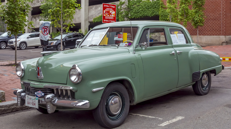 A green vintage Studebaker automobile