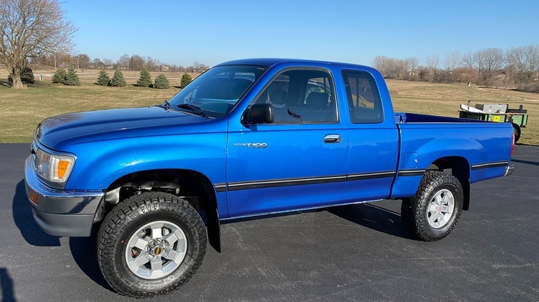 Blue Toyota T100 parked