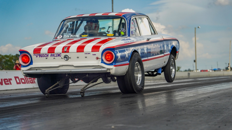 red white and blue Ford Falcon drag racer starting run