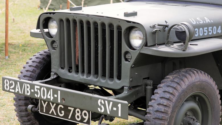 The front of an original military Jeep sporting the nine-slot grille.