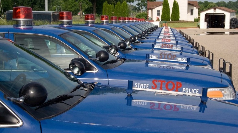 The Michigan State Police's "Blue Goose" with its red "bubble" light and "stop" placard is very unique and identifiable