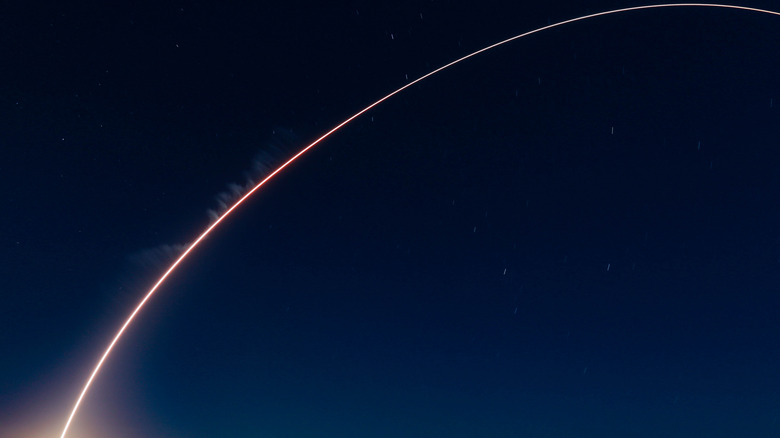 Curved trajectory of a rocket launch