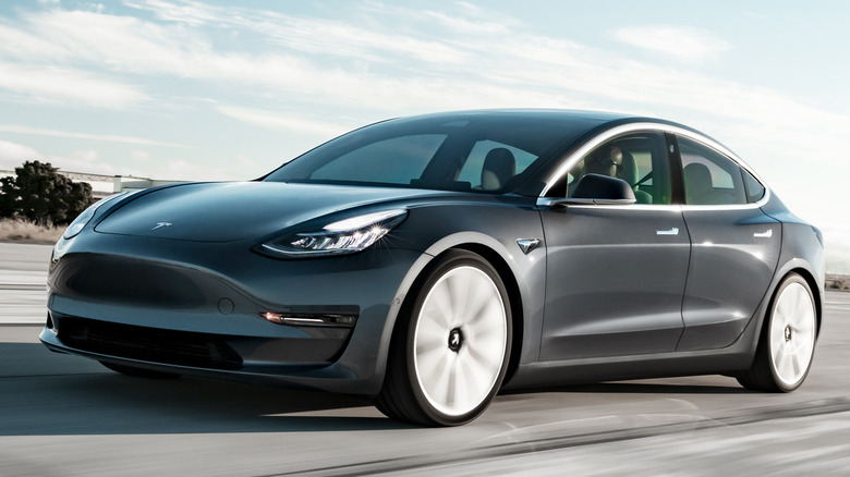 A Tesla EV clad in black paintjob