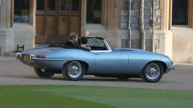 Prince Harry and Meghan in Jaguar E-Type