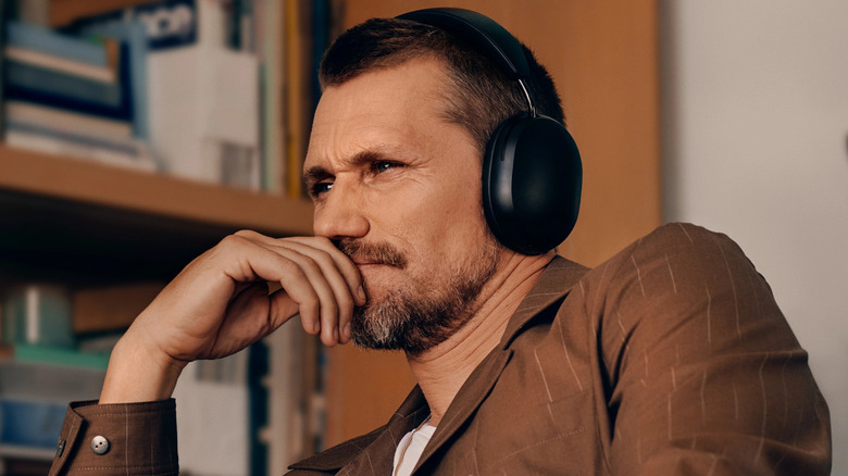 Man wearing Sonos Ace headphones