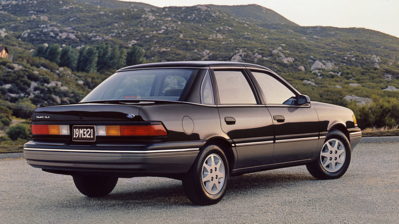 black 1988 Ford Tempo car