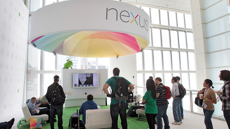 Attendees gather at a display of the Nexus 7 and Nexus Cube at Google's Developers Conference on June 27, 2012