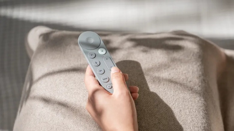 hand holding Google TV Streamer remote