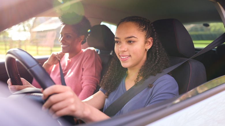 teen driving with adult