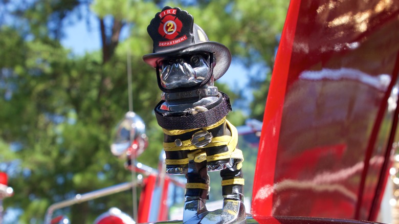 A firefighter-themed Mack Truck bulldog ornament.