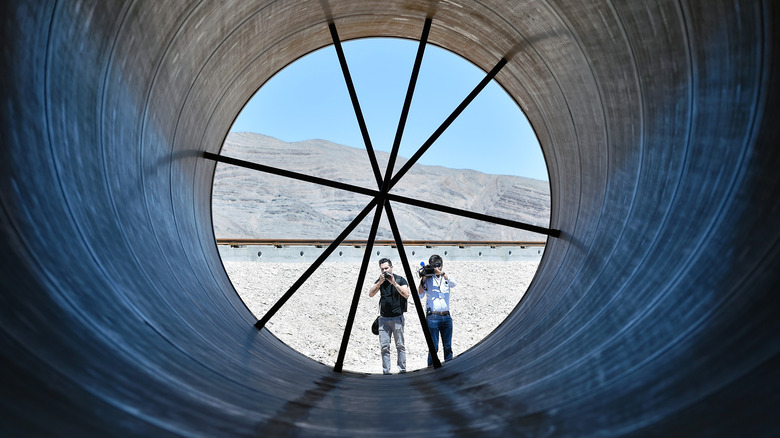 People inside a hyperloop tube