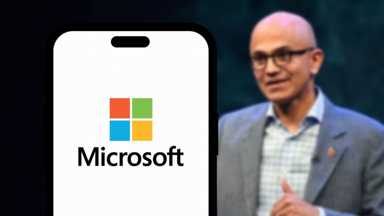 Microsoft logo on a smart phone with Nadella