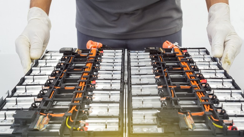 Technician working on EV batteries