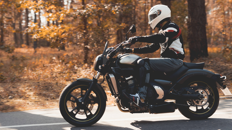 Guy riding electric motorcycle 