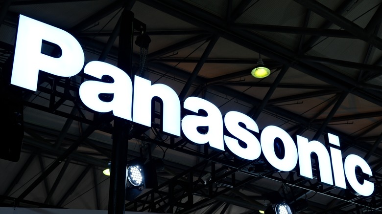 Panasonic's brand logo displayed near the ceiling at a convention