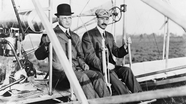 The Wright Brothers in their aircraft