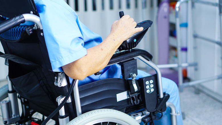 Person using electric wheelchair