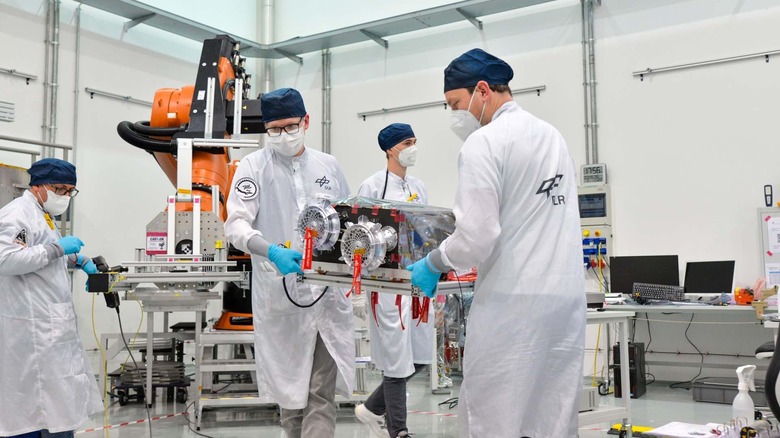 People working on MMX rover