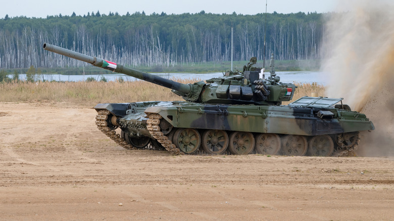 A T-72B3 tank of the Sudan team passes the tank biathlon track during the international war games in Alabino, Russia 2022.