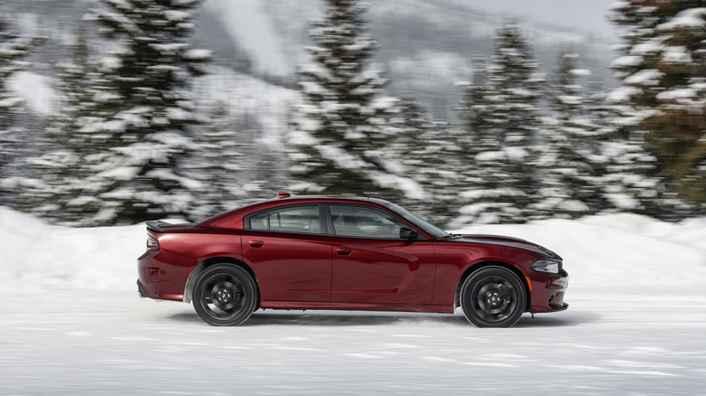 Dodge Charger driving through snow off-road