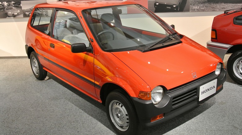 Red Honda Today in a museum