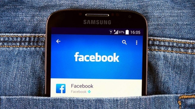 Galaxy S4 in a jeans pocket running Facebook