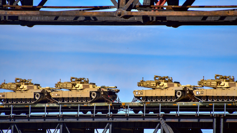 Abrams tanks on a bridge