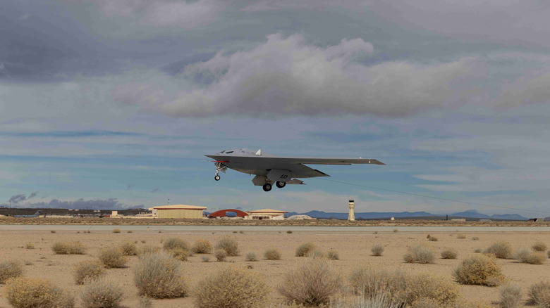 B-21 flying with landing gears down