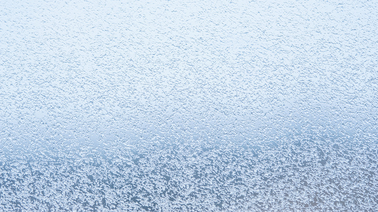 A close-up of frost on a windshield.