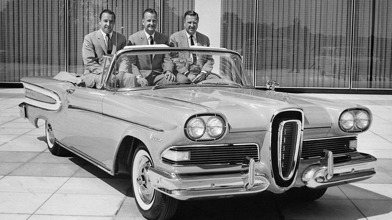 Three men sitting in Ford