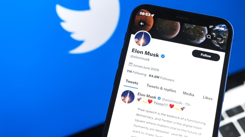 Elon Musk's Twitter profile on a phone screen