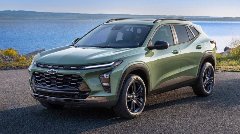 Chevrolet Trax parked on paved surface with a body of water in the background