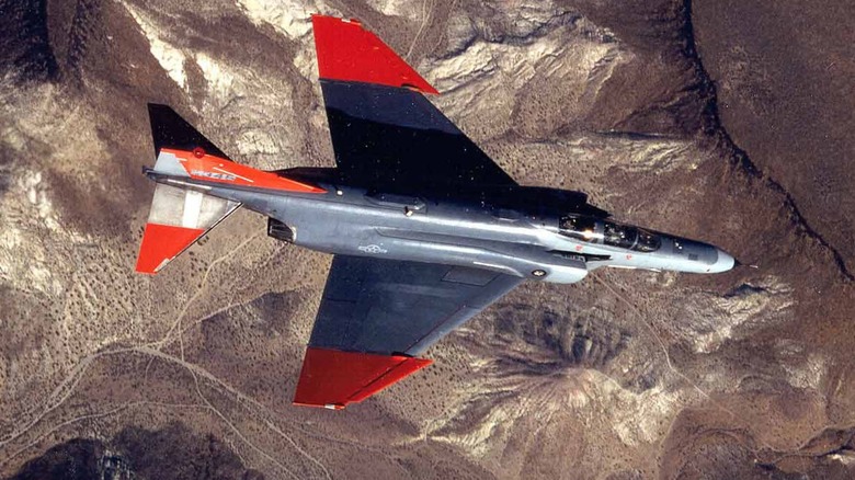 QF-4 flying over a desert