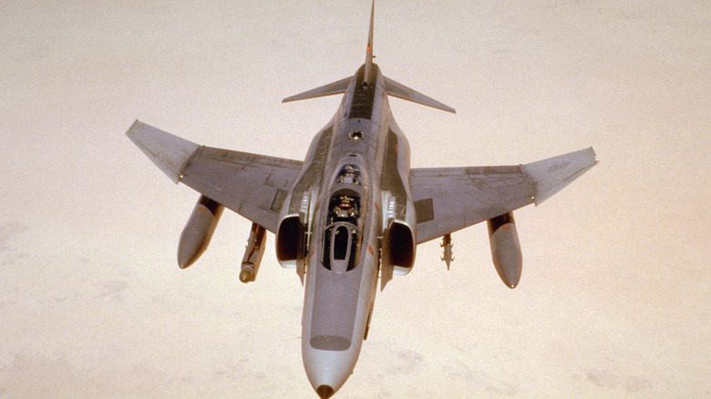 F-4 Phantom flying over a desert