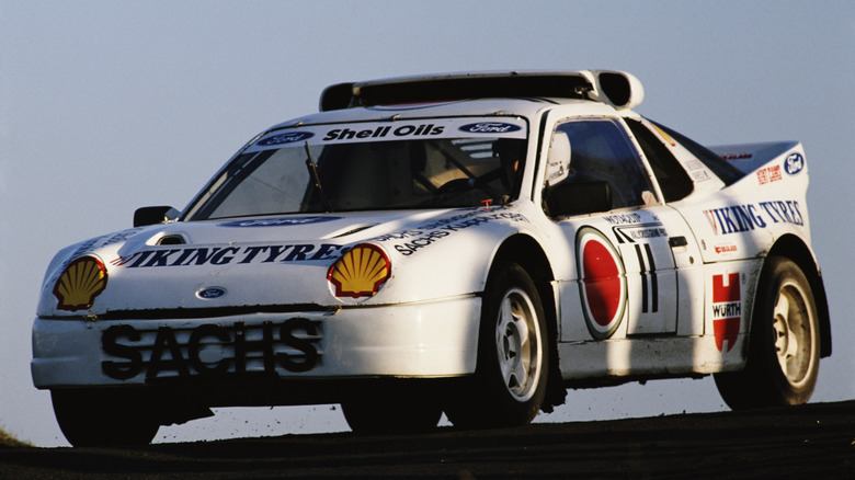 Racer in parked Ford RS200