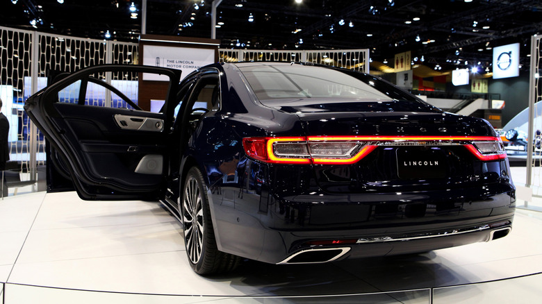 Rear quarter view of 2017 Lincoln Continental sedan doors open driver's side