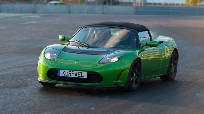 A green Tesla roadster