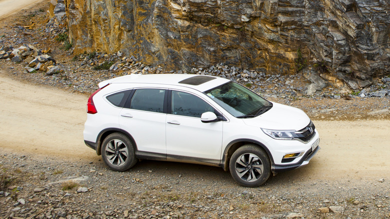 Honda SUV on rocky mountain drive